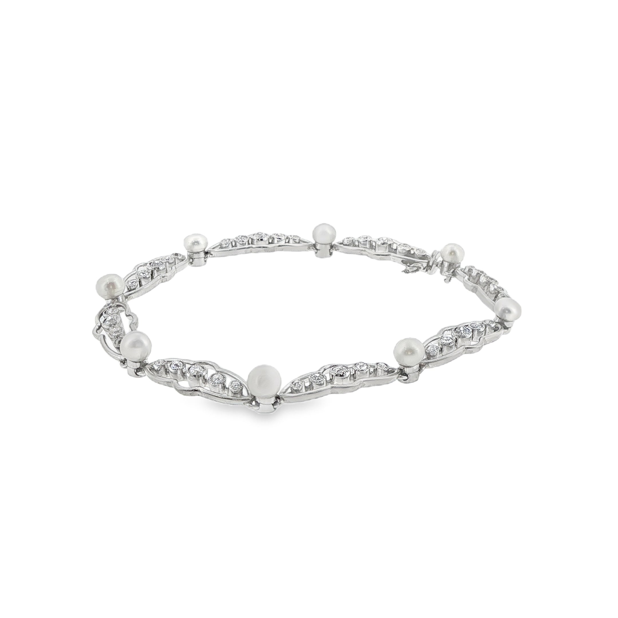 PLATINUM EDWARDIAN PEARL AND DIAMOND BRACELET