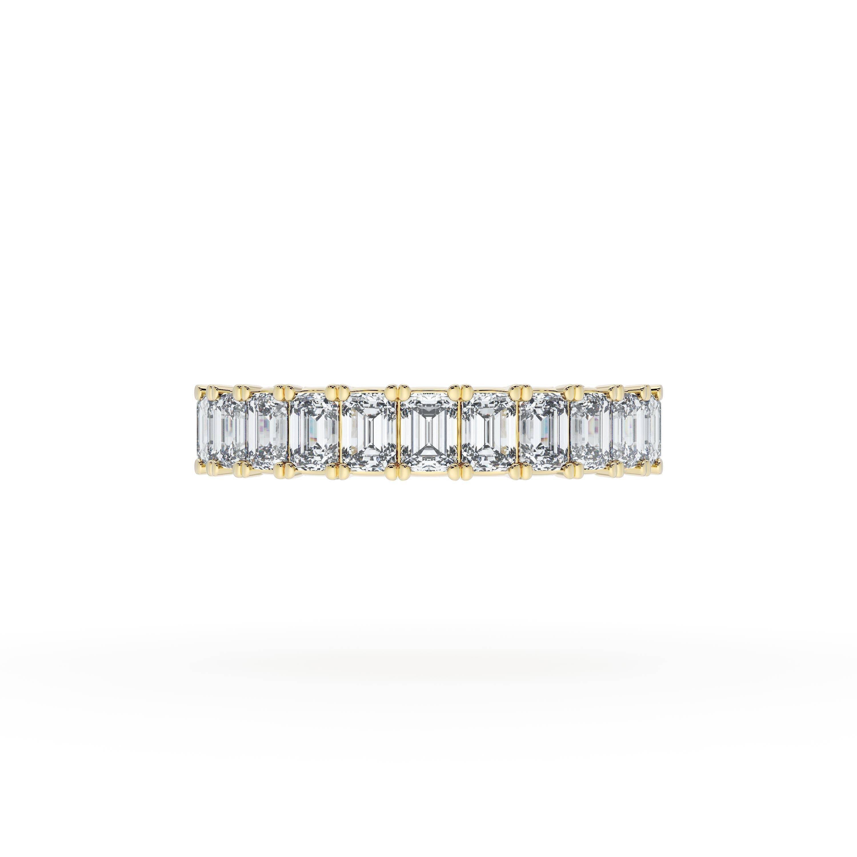 18K YELLOW GOLD EMERALD CUT DIAMOND BAND