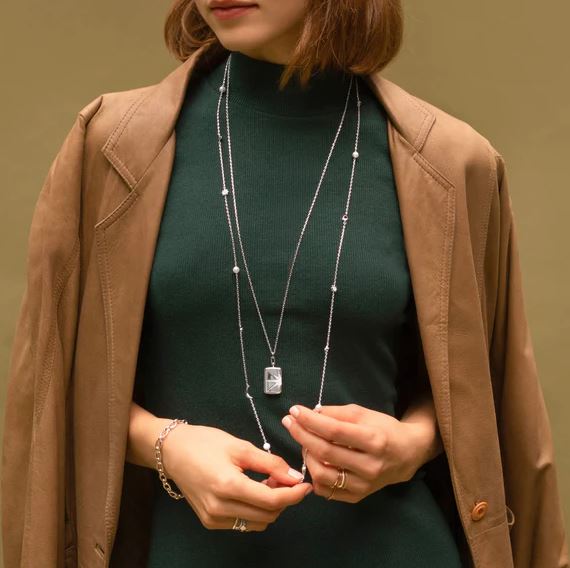 Sterling Silver Sun And Star Locket With Sapphires