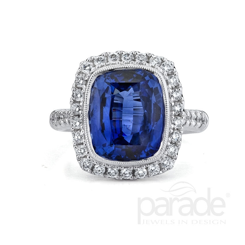 18KW TANZANITE HALO DIAMOND RING
