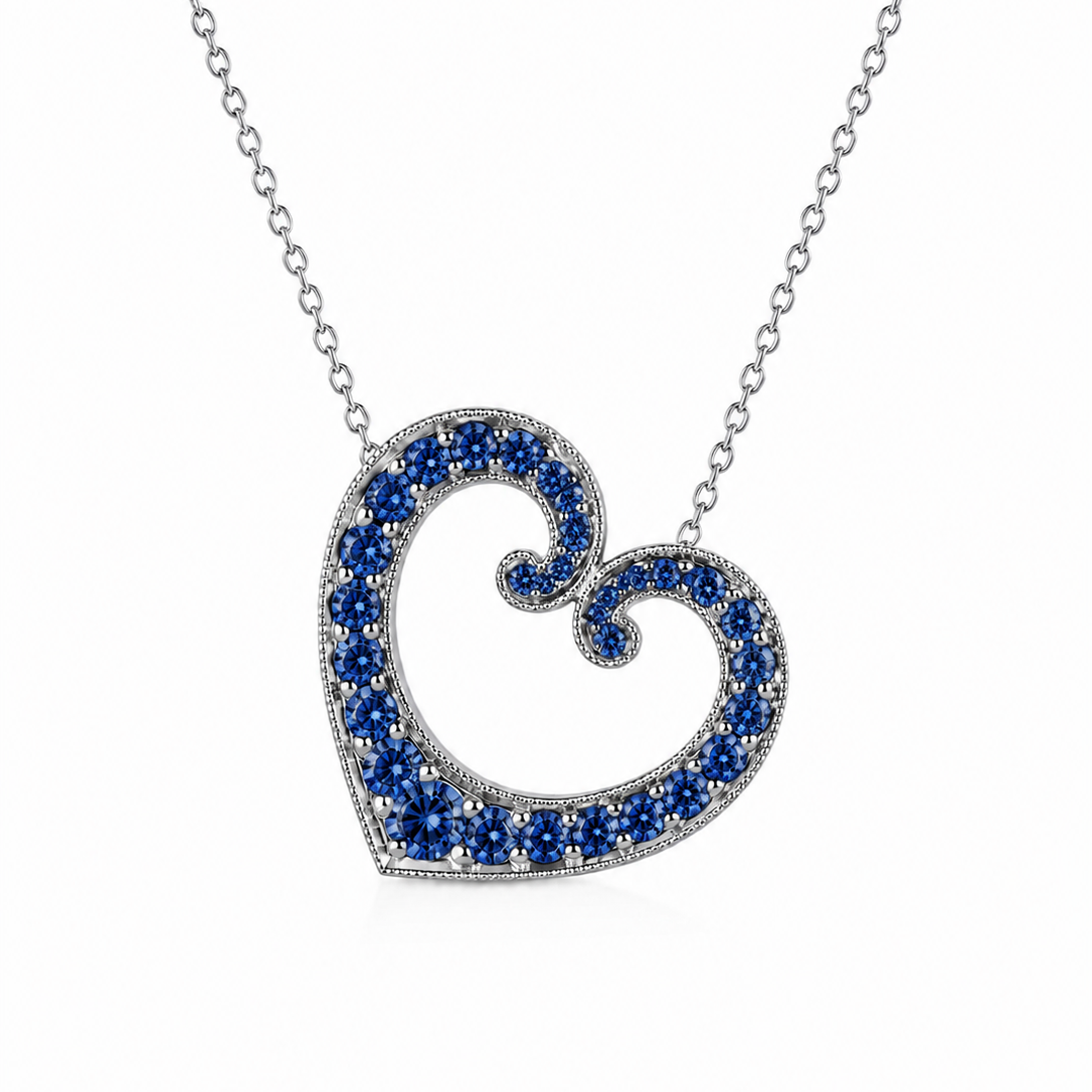 Platinum Estate Diamond and Sapphire Heart Pendant
