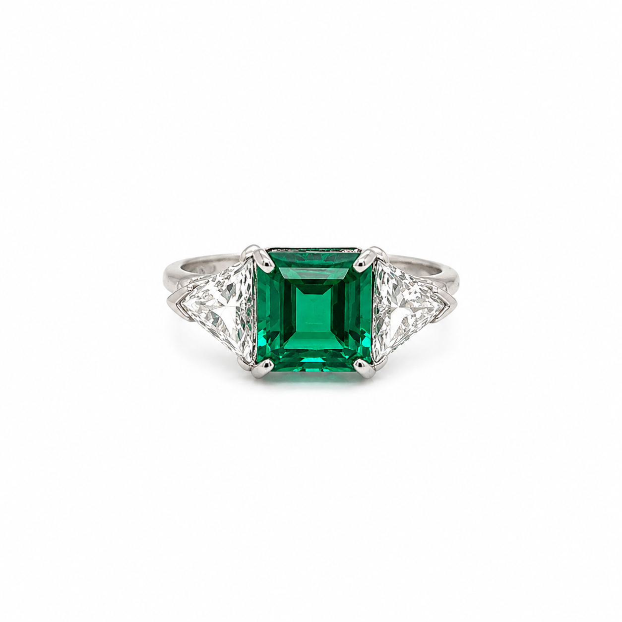 Platinum Estate Emerald Ring with Trillion Diamond Accents